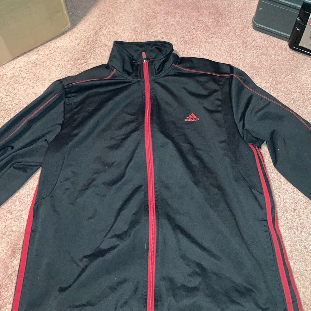 Adidas male crew neck zip up.